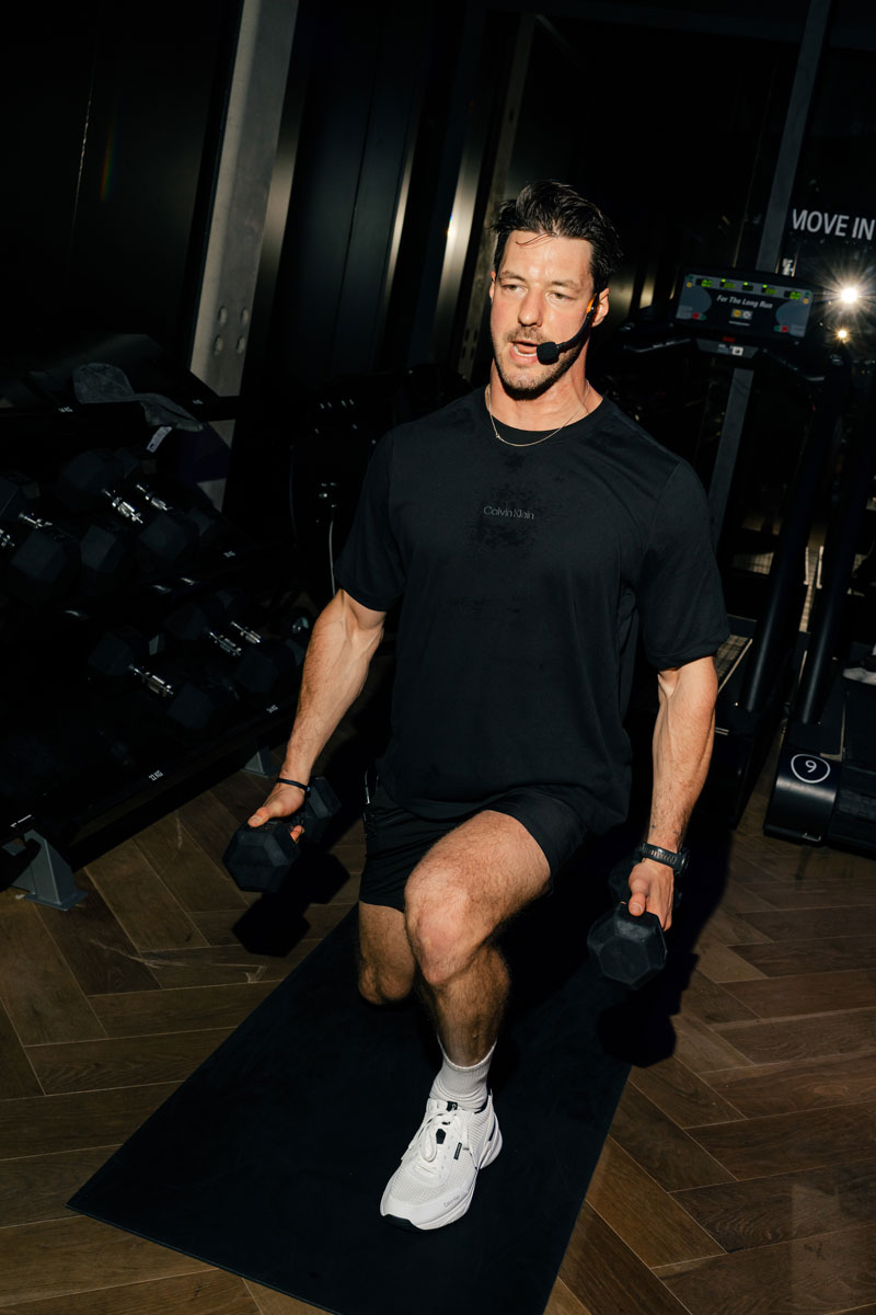 The coach is coaching at the gym.
